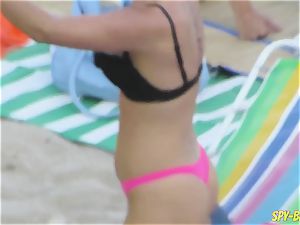 pink swimsuit unexperienced without bra spycam Beach dolls