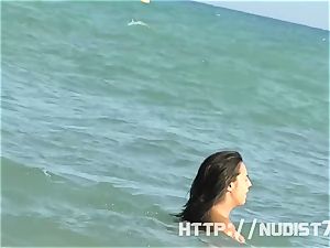 beautiful naturist ladies are captured on camera on a beach