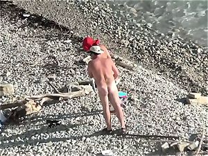cute youthfull teen nudists on the beach